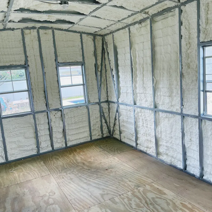 Closed-cell spray foam insulation applied to wall cavities in a residential project in Prospect